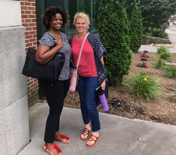 Reynolds (left) and Trainor (right) pose outside of the Turchin Center for the Visual Arts on the first day of their doctoral program at Appalachian. Photo by Amie Snow